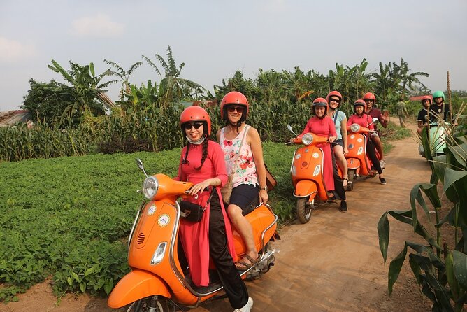 Beautiful Female Riders Vespa Red River Countryside Tour 5 Hours - Co Loa Citadel and the older Hanoi region