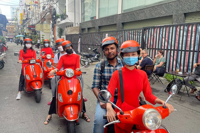 Beautiful Female Riders Vespa Red River Countryside Tour 5 Hours - Long Bien Bridge: Hanoi’s first change of scene