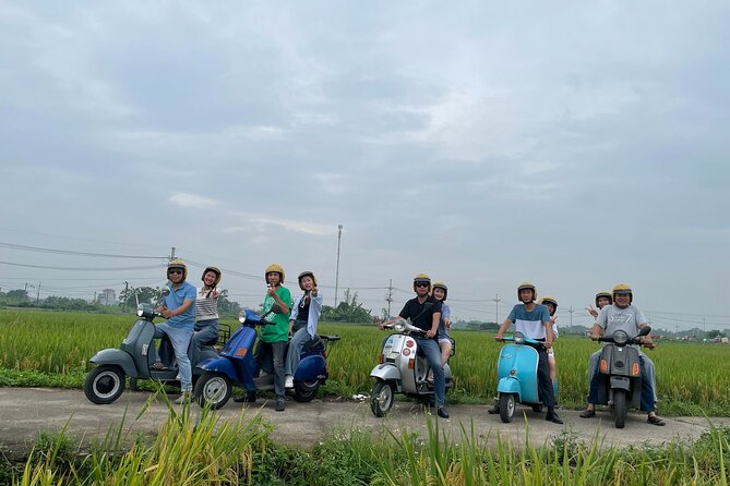 Exploring Vespa Tour Through Little Red River Delta - Long Bien Bridge, a useful link between city and delta