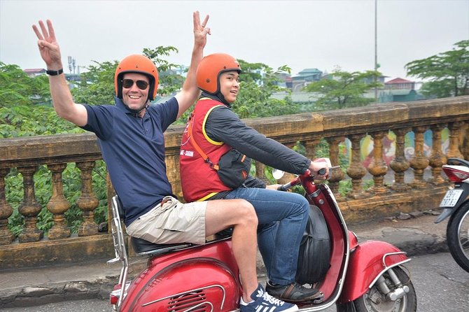 Hanoi By Vespa Tours: HISTORY + CULTURE + SIGHT + FUN 2,5 Hours - Long Bien Bridge and the city’s endurance
