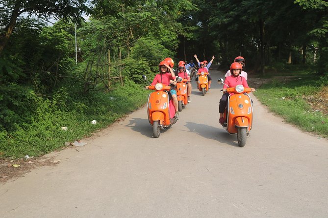 Hanoi Vespa Full Day City & Countryside with Female Ao Dai Riders - Co Loa, rice roads, and a local market