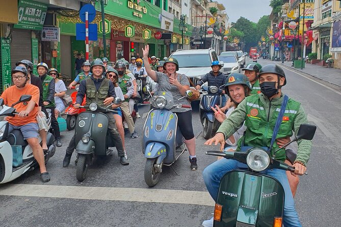 Hanoi Vespa Tours: Food + Culture + Fun on Army Vespa - Crossing Long Bien Bridge above the Red River