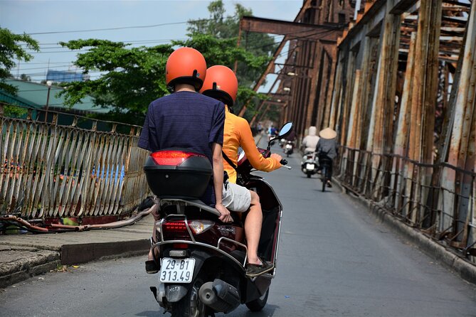 Hanoi Vespa Tours Led By Women: Hanoi City Vespa Tours - Huu Tiep Lake and the downed B-52
