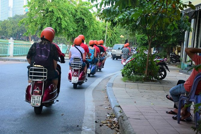 Hanoi Vintage Vespa Tours: HISTORY +FOOD + CULTURE + SIGHT + FUN - Huu Tiep Lake and the downed B-52