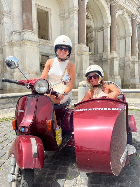 Rome: Evening Fiat 500 and Vespa Prosecco Tour - The Colosseum at night