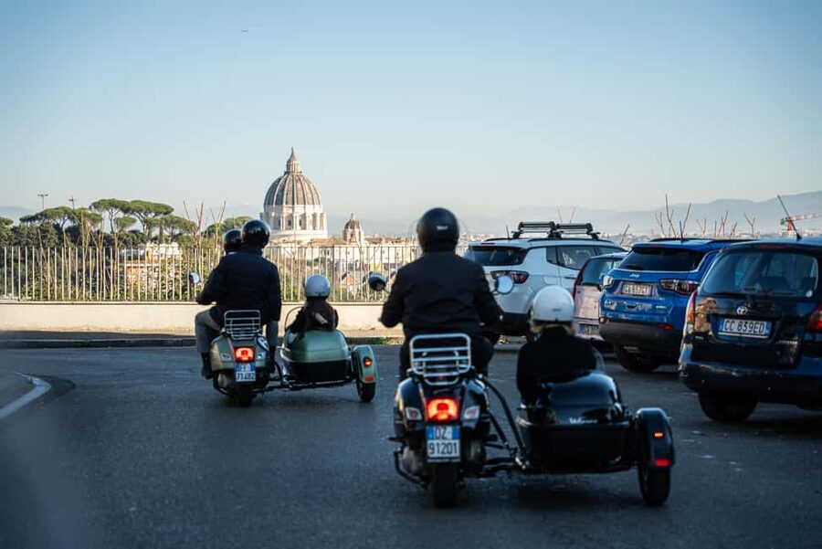 Rome: Evening Vespa Sidecar City Tour - The Colosseum at sunset