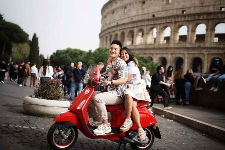 Rome: Vespa Tour with Professional Photographer - Leaving the meeting point on a colorful Vespa