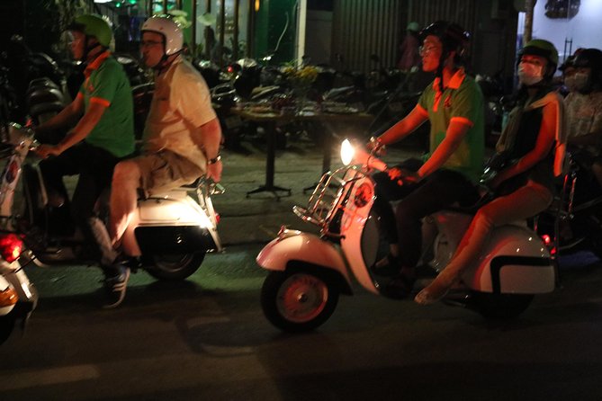 Saigon After Dark Vespa Street Food Tour + Live Music 4 hours - Banana cake and the pleasure of a small street stop