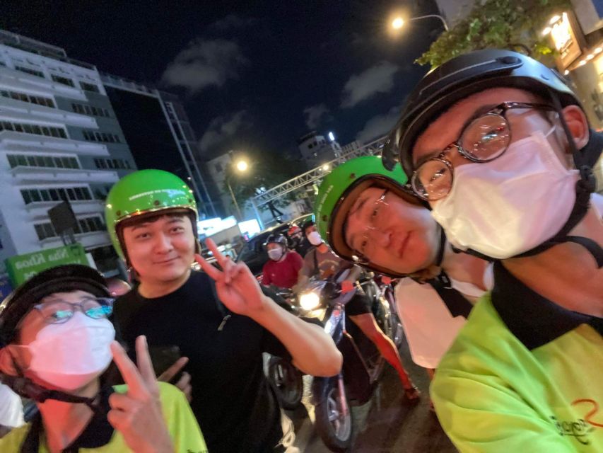 Saigon: Night Sightseeing And Street Food Tour By Vespa - Seafood, Snails, and a Local Beer