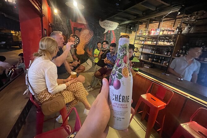 Saigon Night Street Food and Craft Beer Tour by Vespa Scooter - Nguyen Thien Thuat apartment buildings and old Saigon