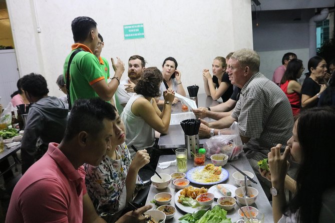 Saigon Vespa By Night Street Food Tour 4,5 Hours - Two local restaurants and the food experience