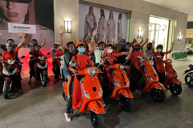 Saigon Vespa By Night Street Food With Female Riders Ao Dai - The 6:00 pm pickup and first look at Ho Chi Minh City
