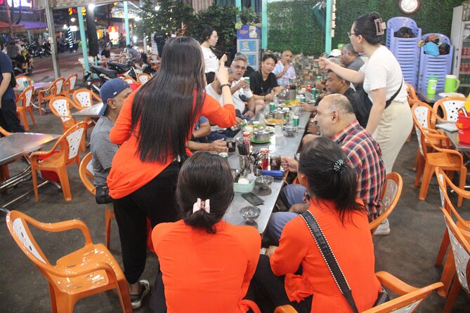 Saigon Vespa By Night Street Food With Female Riders Ao Dai - Vietnamese coffee and a music bar add local color