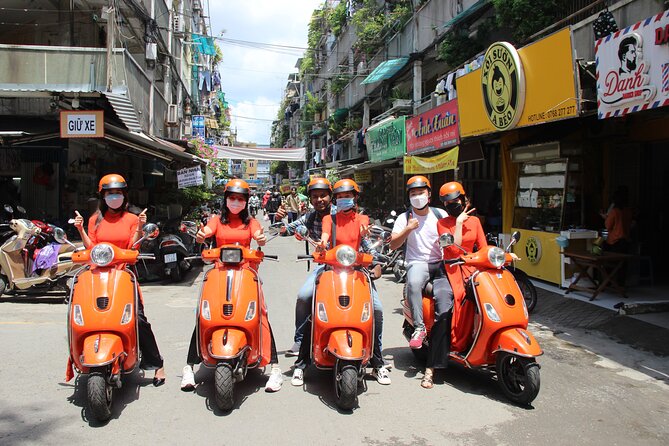 The Insider's Saigon With Female Ao Dai Riders Vespa 4,5 Hours - Ho Thi Ky Flower Market and local market life