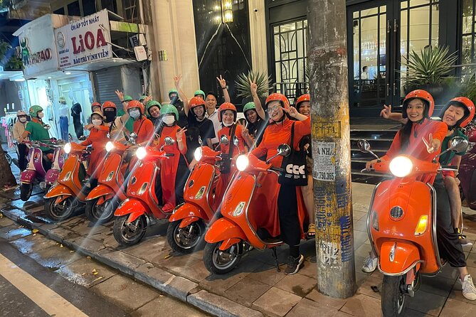 Vespa Female Ao Dai riders Night Street Food + See Train Street - Why a Vespa is a good way to see Hanoi at night