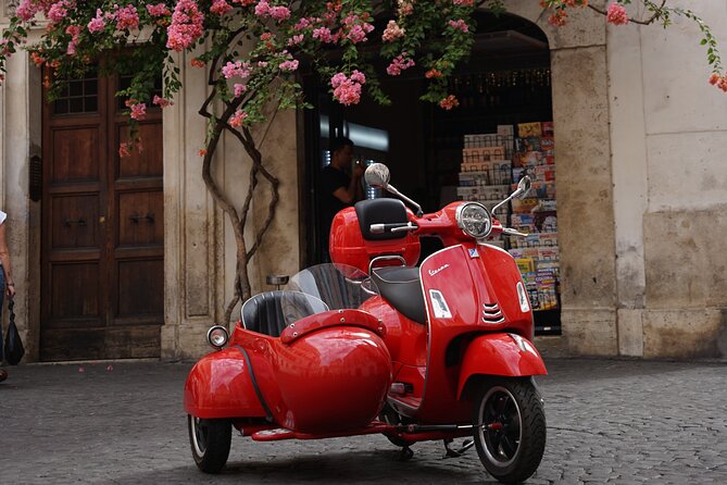 Vespa Sidecar Tour in Rome - The Colosseum: a quick first photograph